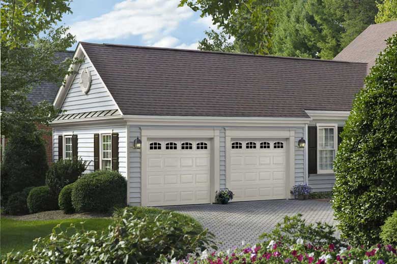 Garage door with short panel design